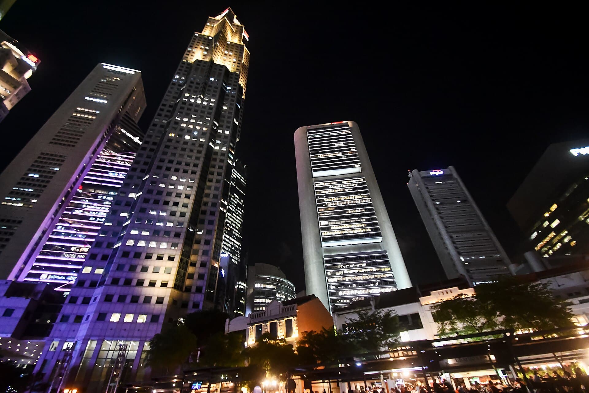 Boat Quay and shophouses with the Singapore CBD towers behind